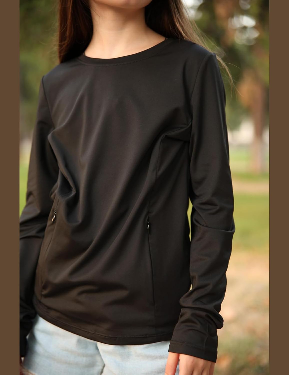 image:imageZaclotre Girls Athletic Long Sleeve Shirts with Zipper Pockets Performance fit for kids sports gym and outdoor activities Activewear tops Features breathability and moisture wickingBlack