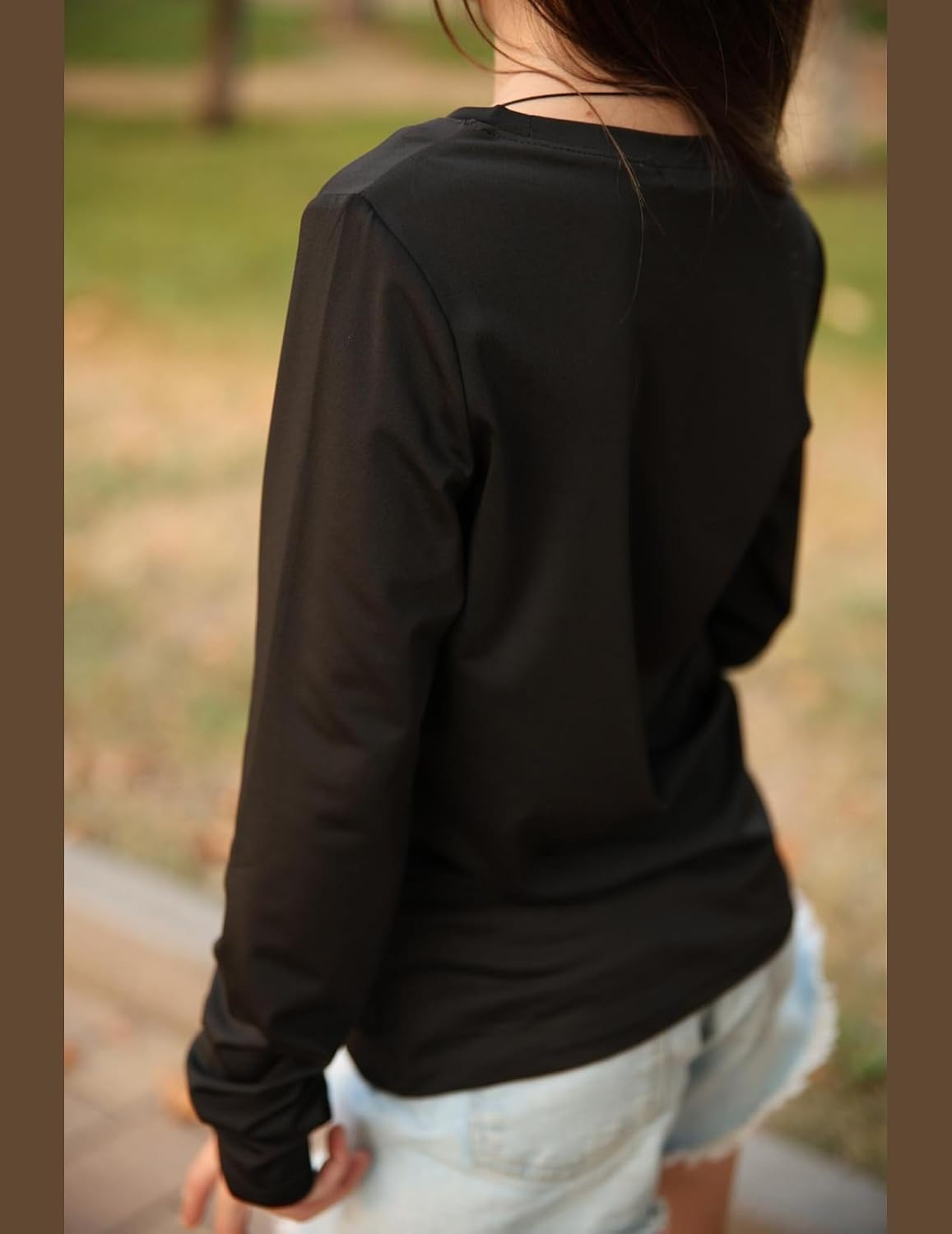 image:imageZaclotre Girls Athletic Long Sleeve Shirts with Zipper Pockets Performance fit for kids sports gym and outdoor activities Activewear tops Features breathability and moisture wickingBlack