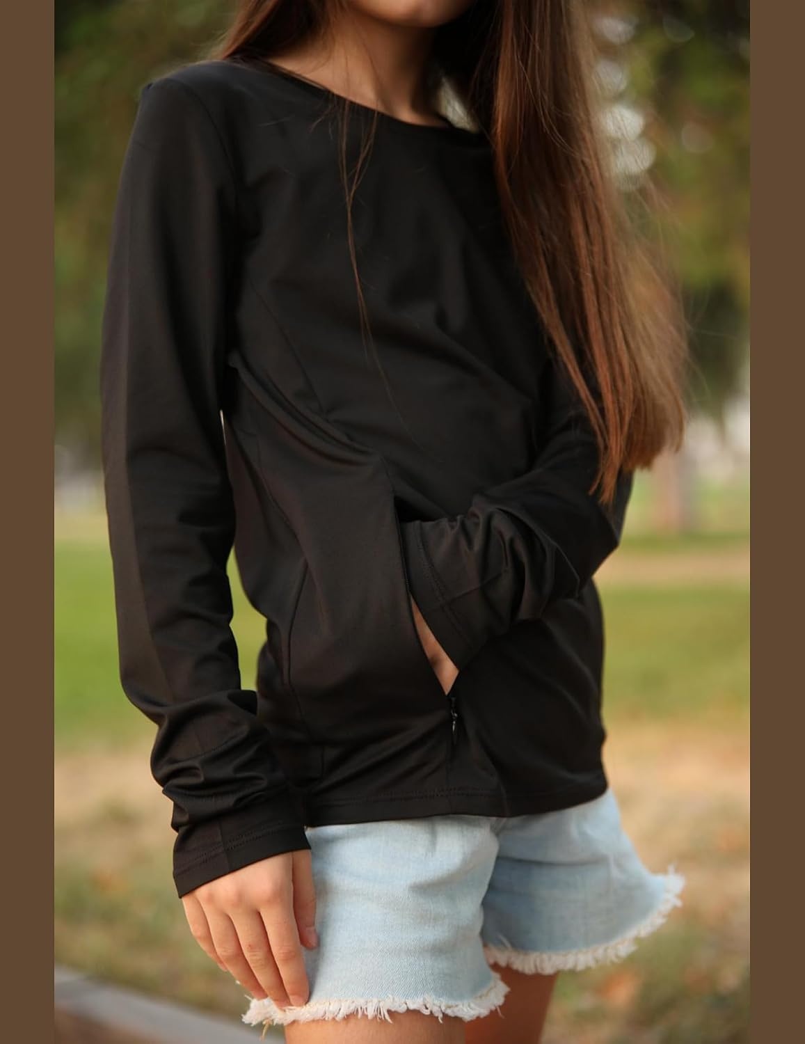 image:imageZaclotre Girls Athletic Long Sleeve Shirts with Zipper Pockets Performance fit for kids sports gym and outdoor activities Activewear tops Features breathability and moisture wickingBlack