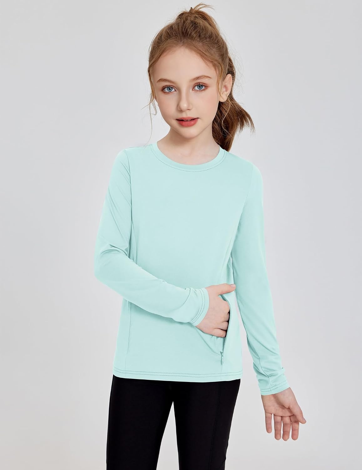 image:imageZaclotre Girls Athletic Long Sleeve Shirts with Zipper Pockets Performance fit for kids sports gym and outdoor activities Activewear tops Features breathability and moisture wickingAqua