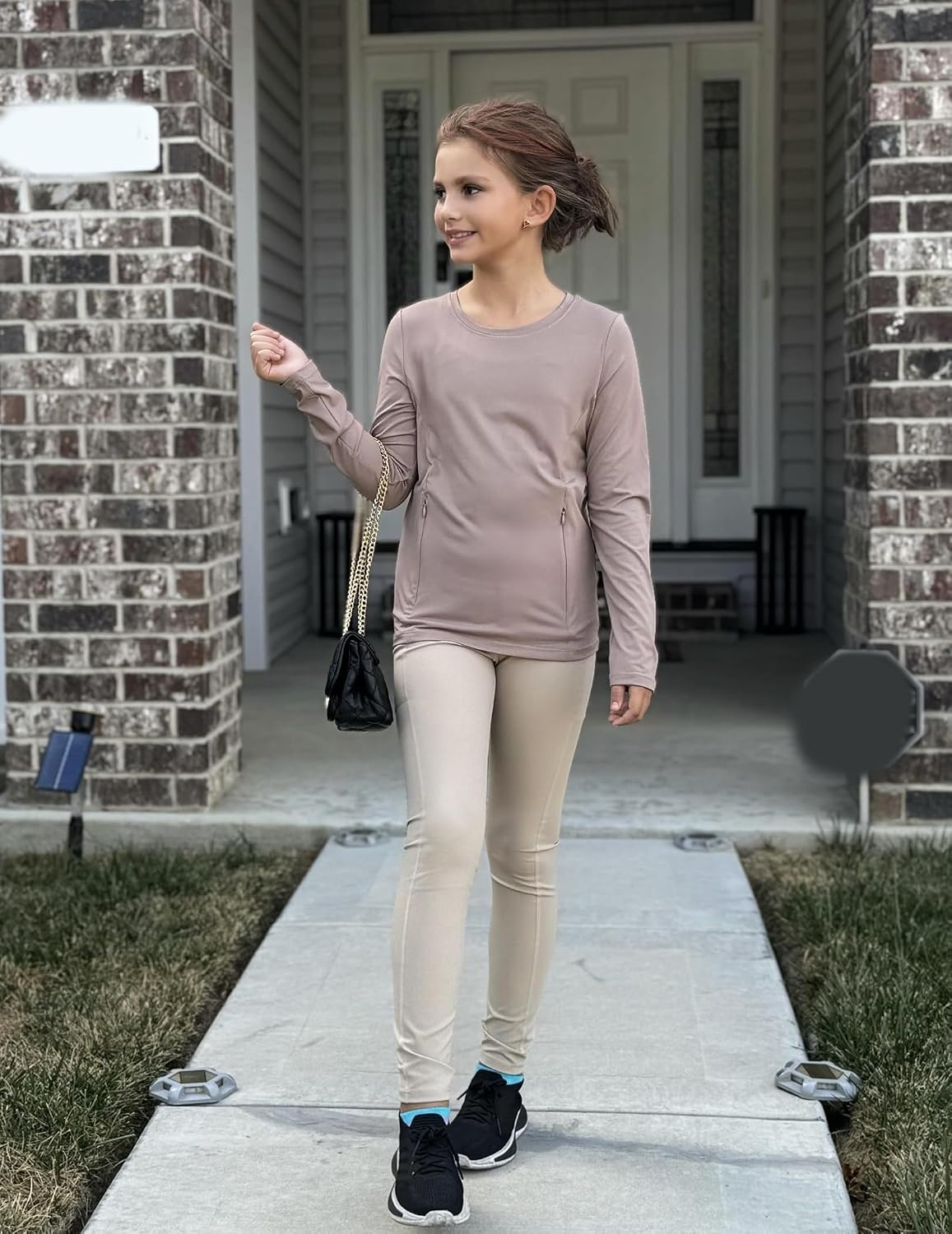 image:imageZaclotre Girls Athletic Long Sleeve Shirts with Zipper Pockets Performance fit for kids sports gym and outdoor activities Activewear tops Features breathability and moisture wickingKhaki