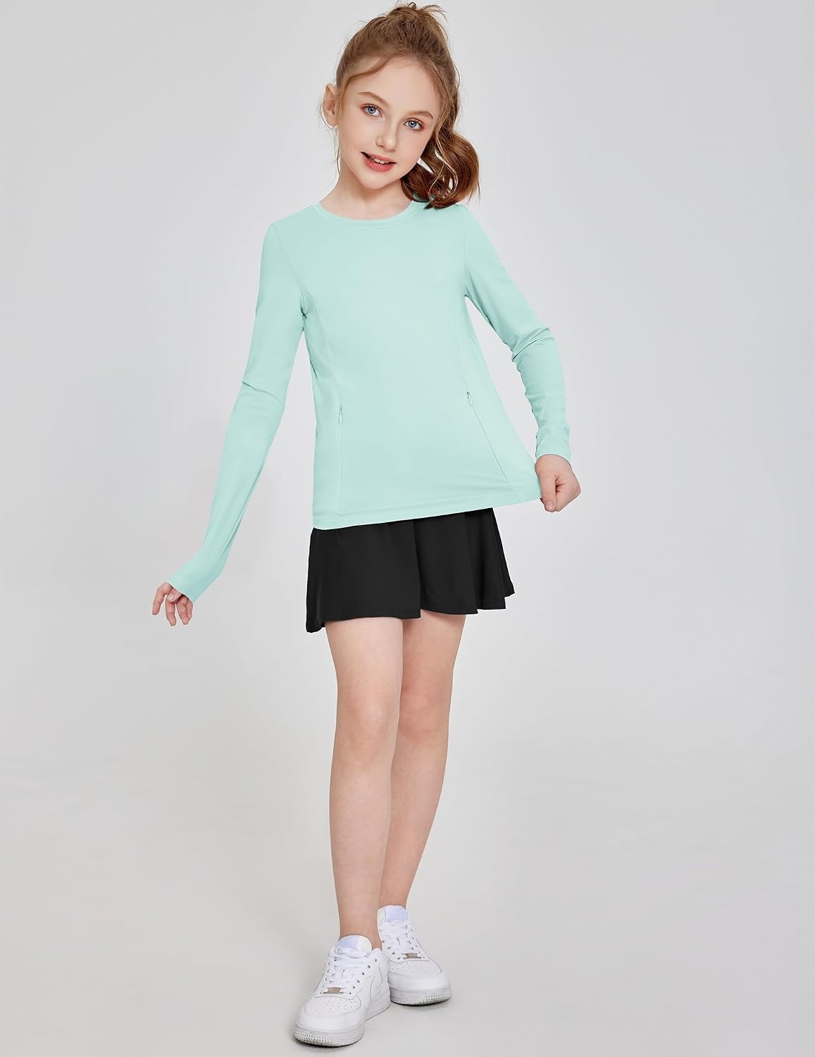 image:imageZaclotre Girls Athletic Long Sleeve Shirts with Zipper Pockets Performance fit for kids sports gym and outdoor activities Activewear tops Features breathability and moisture wickingAqua